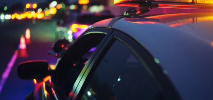 A policeman stops a driver, who needs an experienced DUI lawyer Augusta GA trusts on their side