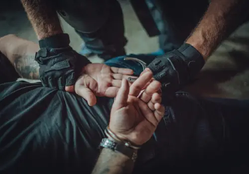 A man being arrested, needing representation from a criminal defense attorney for Augusta GA